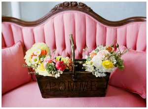 Flowers on chairs. Paisley and Jade specializing in vintage and eclectic rentals for weddings trade shows photo shots or film and theatrical productions