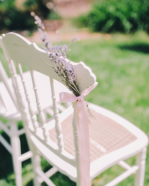 Gorgeous wedding and event floral designs and bouquets displayed on chairs. Paisley and Jade specializing in vintage and eclectic rentals for weddings trade shows photo shots or film and theatrical productions