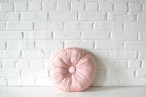 Dainty pink vintage pillow available to rent from Paisley and Jade 