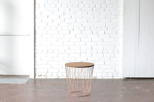 Fun modern end tables with artistic copper bases 