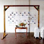 Modern metallic photo display and seating chart by Paisley and Jade