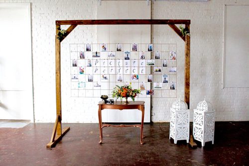 Modern metallic photo display and seating chart by Paisley and Jade