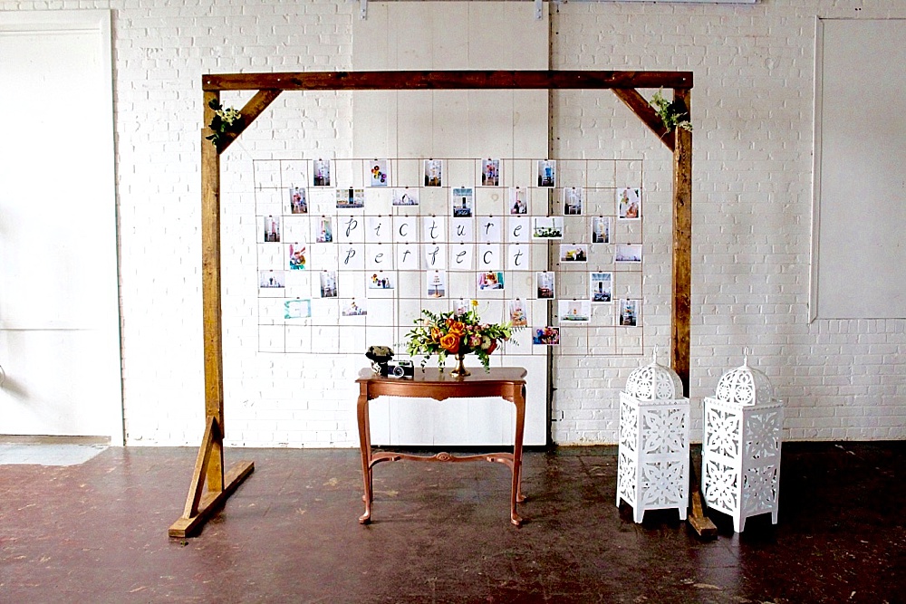 Modern metallic photo display and seating chart by Paisley and Jade