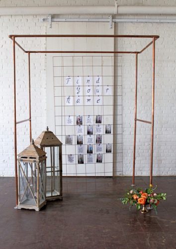 Modern metallic photo display and seating chart by Paisley and Jade