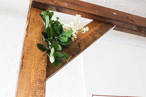 Modern metallic photo display and seating chart by Paisley and Jade