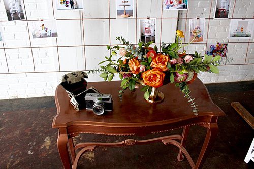 Modern metallic photo display and seating chart by Paisley and Jade