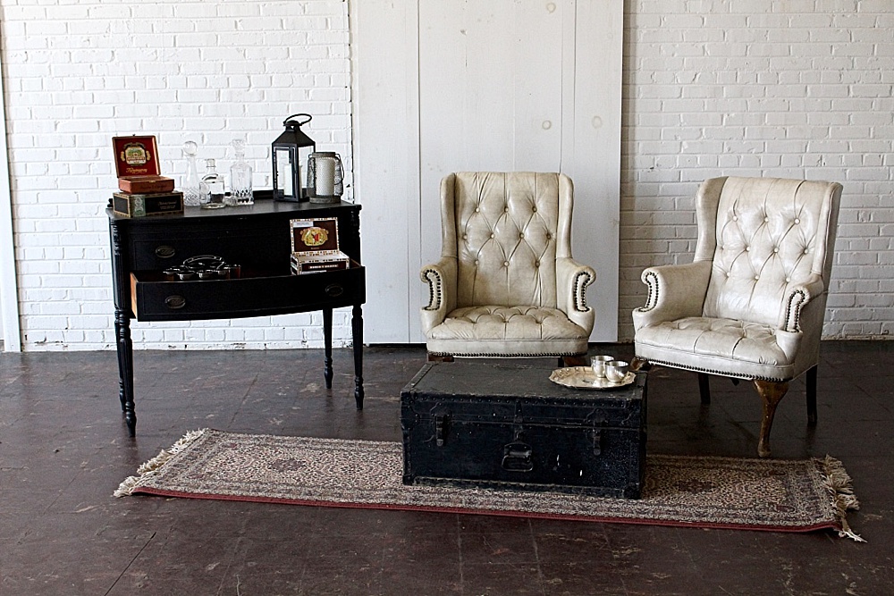 Simple and sophisticated cigar bar and whiskey lounge created with rental items by Paisley and Jade