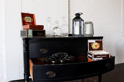 Simple and sophisticated cigar bar and whiskey lounge created with specialty rental times by Paisley and Jade