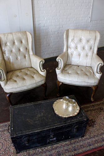 Simple and sophisticated cigar bar and whiskey lounge created with specialty rental times by Paisley and Jade
