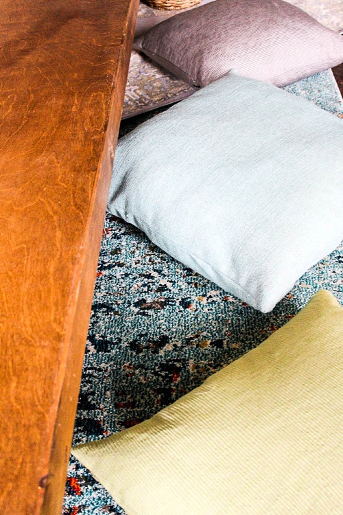 Inspiration station with gorgeous boho-chic low set wooden tables built and styled by Paisley and Jade