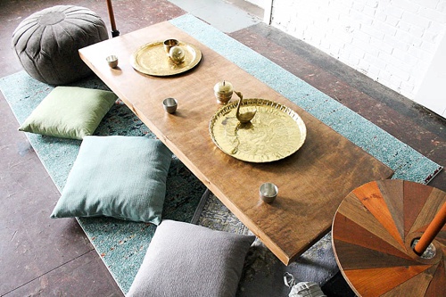 Inspiration station with gorgeous boho-chic low set wooden tables built and styled by Paisley and Jade
