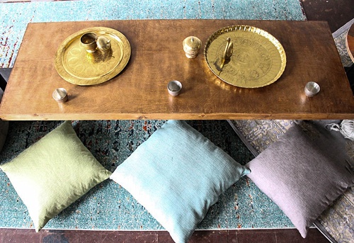 Inspiration station with gorgeous boho-chic low set wooden tables built and styled by Paisley and Jade