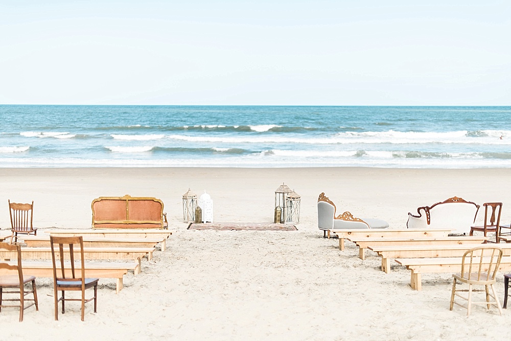Gorgeous oceanfront beach wedding in Sandbridge Virginia with eclectic and vintage furniture and decor rentals by Paisley and Jade