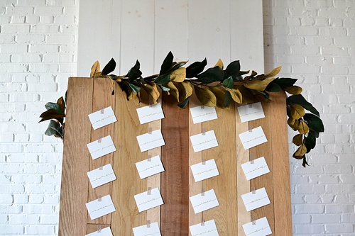 Simple and chic guest seating charts created with rental pieces by Paisley and Jade 