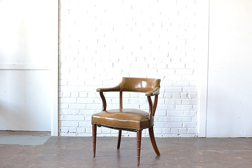 The Adams leather chair available for rental by Paisley & Jade 