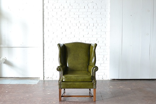 The Franklin upholstered chair available for rent by Paisley & Jade 