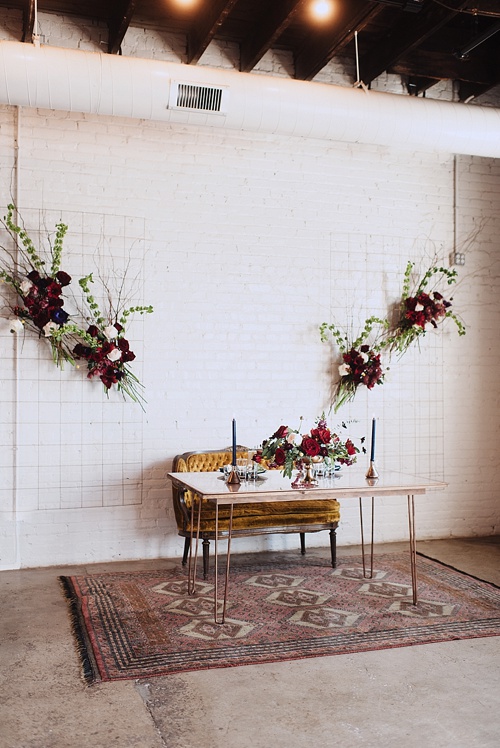 Eclectic and artsy wedding inspiration at The Hofheimer Building in Richmond Va with specialty rentals by Paisley & Jade. Images by Alex C Tenser Photography 