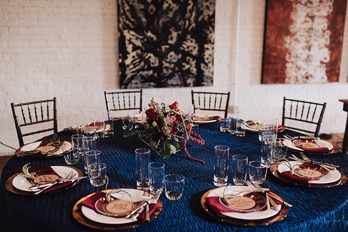Eclectic and artsy wedding inspiration at The Hofheimer Building in Richmond Va with specialty rentals by Paisley & Jade. Images by Alex C Tenser Photography 