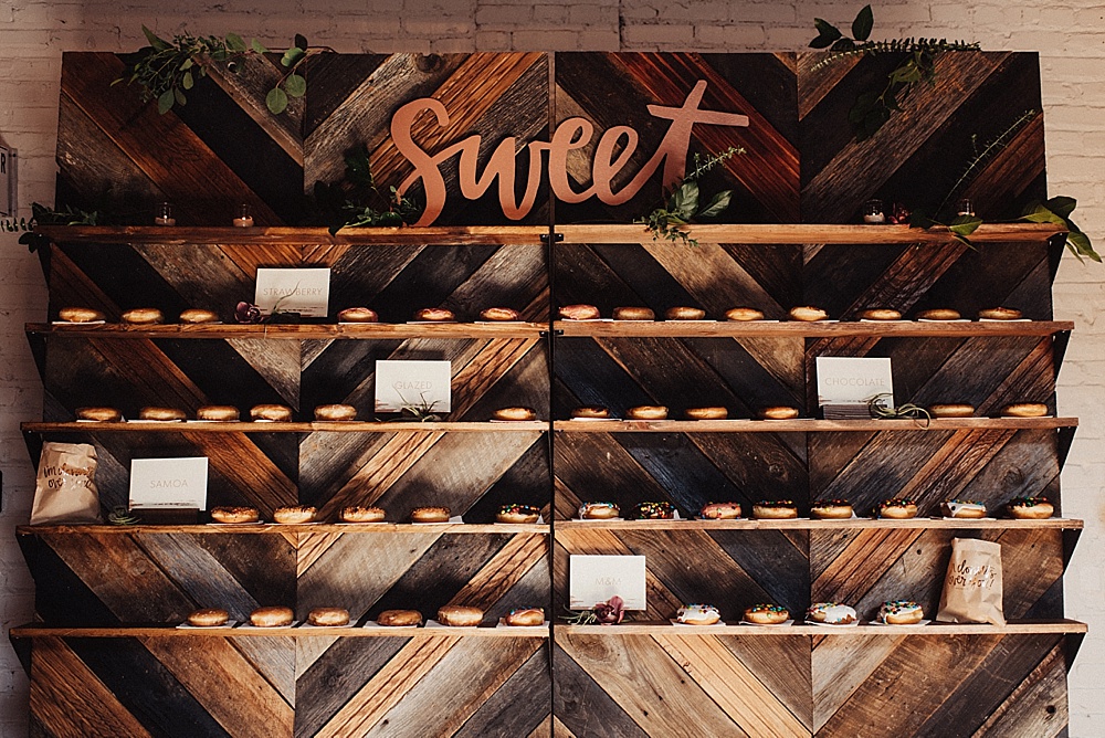 Donut wall created with custom built chevron wooden backdrops available for rent by Paisley and Jade