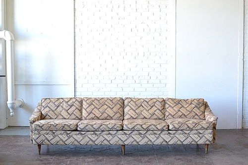 Mid-Century Modern sofa named The Barnegat available for rent by Paisley & Jade 