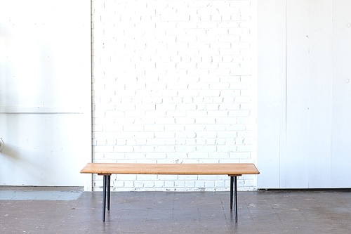 Mid Century Modern coffee table available for rent by Paisley & Jade 