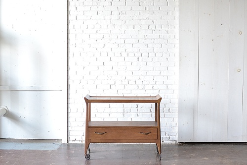 Mid Century Modern bar cart available for rent by Paisley & Jade 