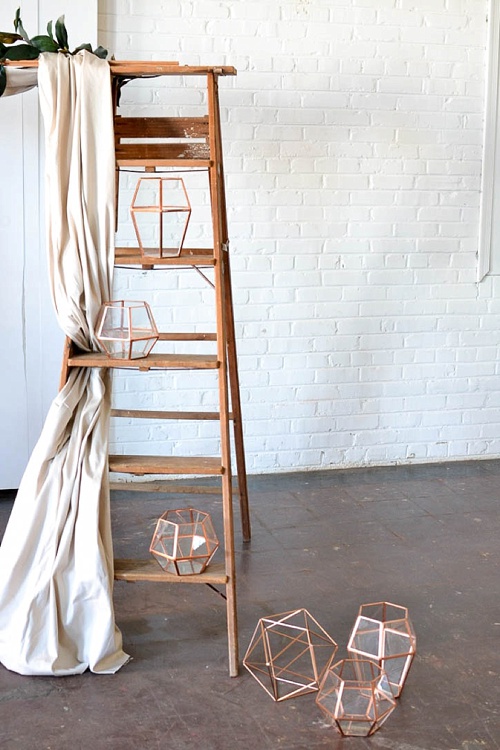 Arbor created with vintage ladders and copper decor pieces available for rent by Paisley and Jade 