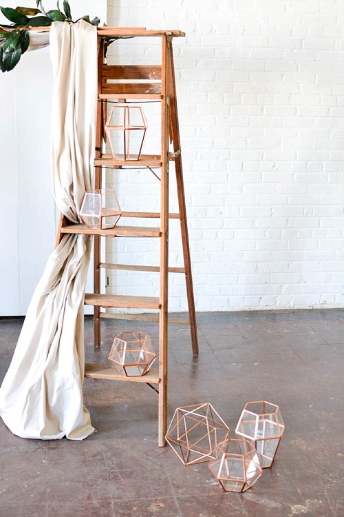 Arbor created with vintage ladders and copper decor pieces available for rent by Paisley and Jade 