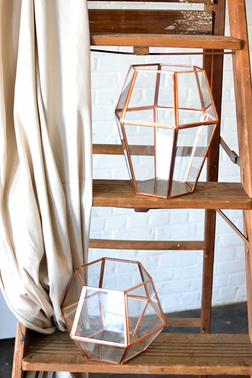 Arbor created with vintage ladders and copper decor pieces available for rent by Paisley and Jade 