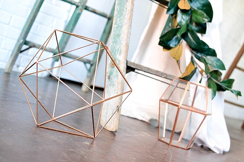 Arbor created with vintage ladders and copper decor pieces available for rent by Paisley and Jade 