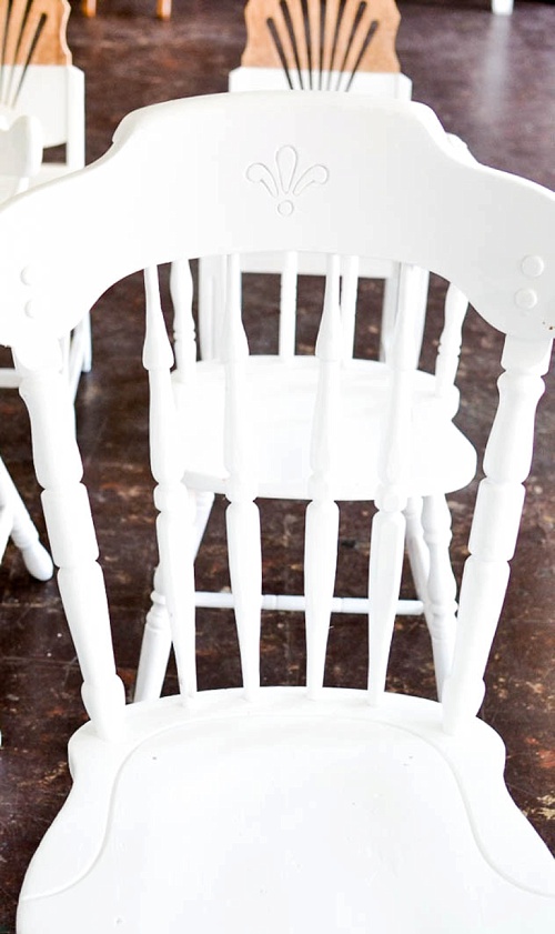 Inspiration Station wedding ceremony design featuring wooden pedestals and chairs available for rent by Paisley and Jade 