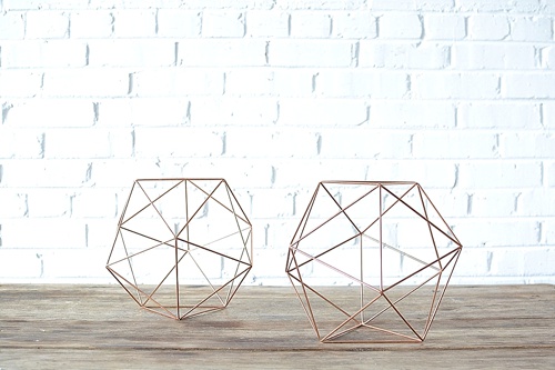 Geometric Copper Shapes available for rent by Paisley & Jade 