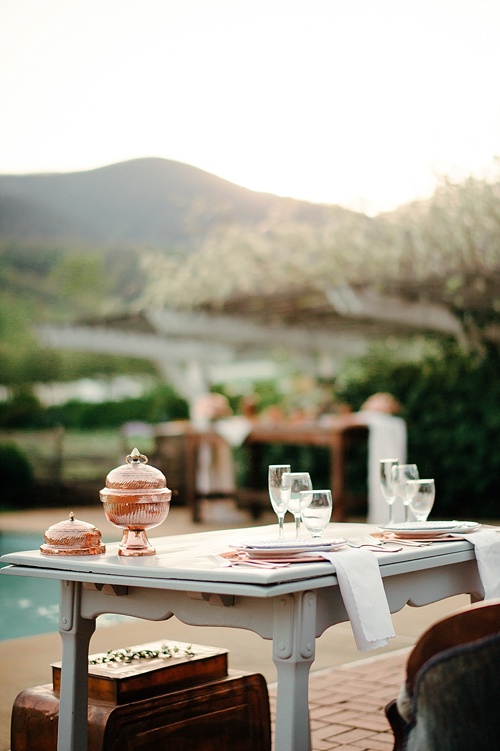 Styled shoot featuring copper urns and other specialty decor items available for rent by Paisley & Jade 