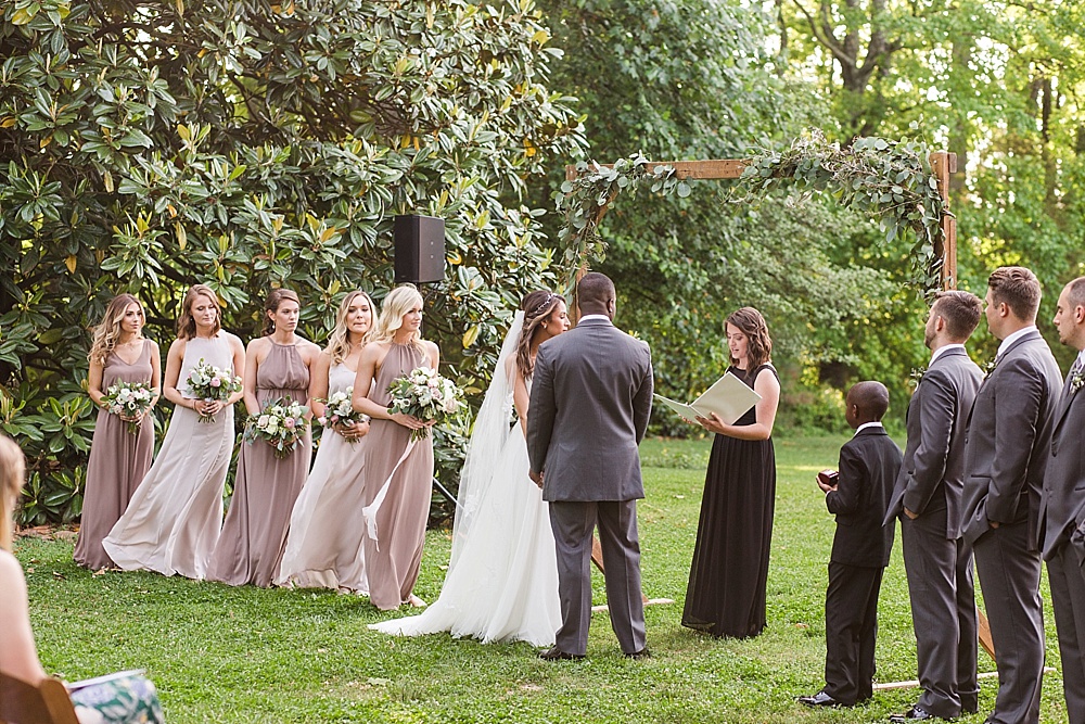 Beautiful pastel outdoor wedding at Seven Springs Farm with specialty and vintage rentals by Paisley & Jade