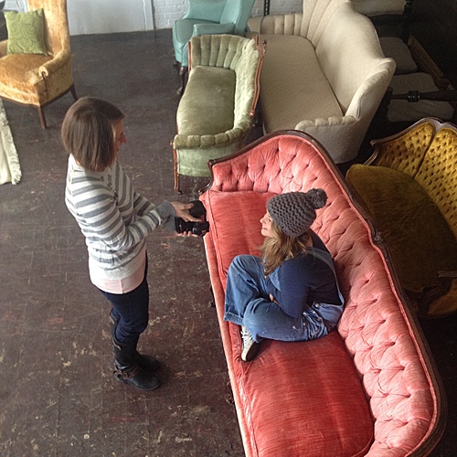 Co-captain of Paisley & Jade, Perkins, posed on an upholstered couch while Stephanie Yonce Photography takes a quick photo!