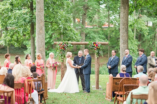 Gorgeous outdoor wedding ceremony on the campus of Hampden-Sydney College in Virginia featuring ceremony seating by Paisley & Jade 