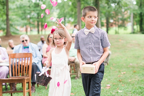 Gorgeous outdoor wedding ceremony on the campus of Hampden-Sydney College in Virginia featuring ceremony seating by Paisley & Jade 