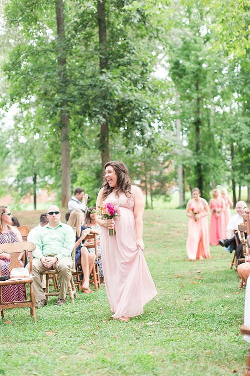 Gorgeous outdoor wedding ceremony on the campus of Hampden-Sydney College in Virginia featuring ceremony seating by Paisley & Jade 