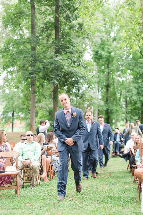 Gorgeous outdoor wedding ceremony on the campus of Hampden-Sydney College in Virginia featuring ceremony seating by Paisley & Jade 