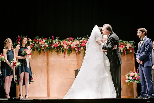 Elegant Copper Wedding Ceremony at Altria Theater in Richmond, Va with specialty rentals by Paisley & Jade 