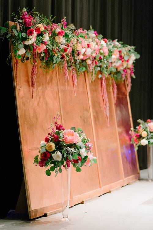 Elegant Copper Wedding Ceremony at Altria Theater in Richmond, Va with specialty rentals by Paisley & Jade 