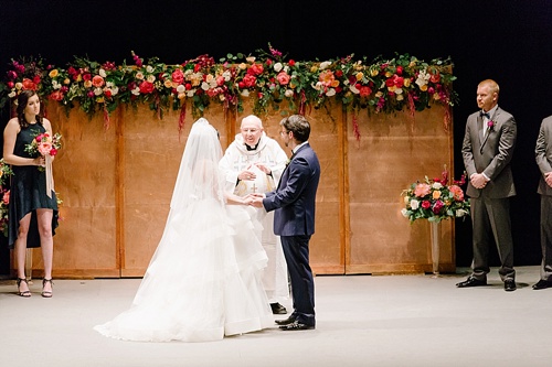 Elegant Copper Wedding Ceremony at Altria Theater in Richmond, Va with specialty rentals by Paisley & Jade 