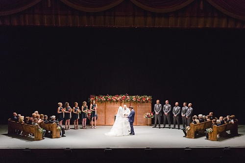 Elegant Copper Wedding Ceremony at Altria Theater in Richmond, Va with specialty rentals by Paisley & Jade 