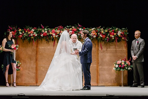 Elegant Copper Wedding Ceremony at Altria Theater in Richmond, Va with specialty rentals by Paisley & Jade 