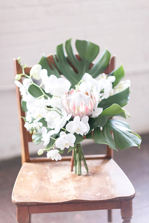 Tropical and white wedding inspiration with showroom and specialty rentals by Paisley & Jade 