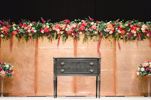 Elegant Copper Wedding Ceremony at Altria Theater in Richmond, Va with specialty rentals by Paisley & Jade
