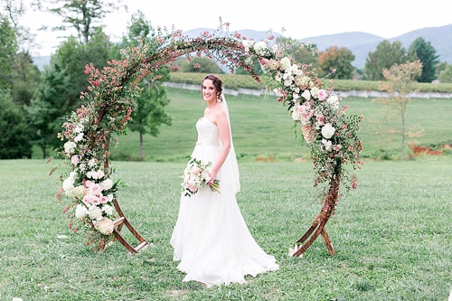 Romantic summer outdoor winery wedding with wooden arbor available for rent by Paisley and Jade