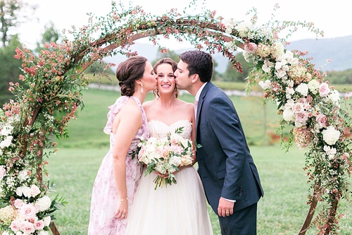 Romantic summer outdoor winery wedding with wooden arbor available for rent by Paisley and Jade