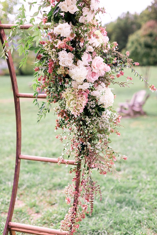 Romantic summer outdoor winery wedding with wooden arbor available for rent by Paisley and Jade