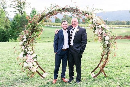 Romantic summer outdoor winery wedding with wooden arbor available for rent by Paisley and Jade